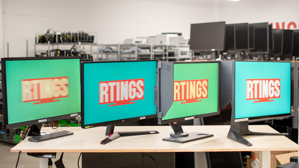 Monitors sitting on a table.