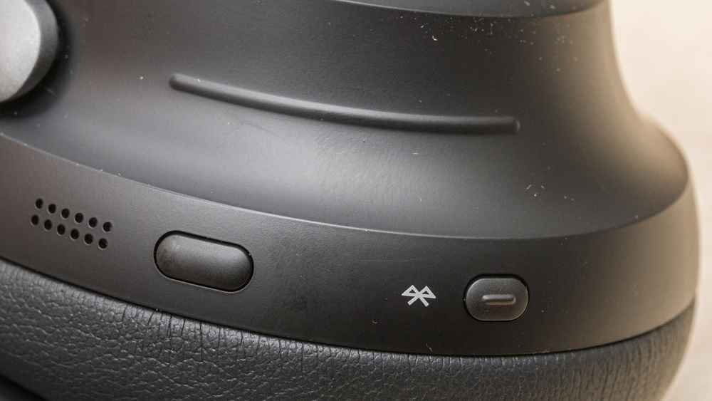 An close up of the Bose QuietComfort Ultra Headphones Wireless on-ear controls.