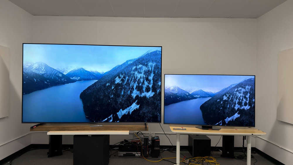 The 100-inch and 65-inch Hisense U8QG side-by-side.