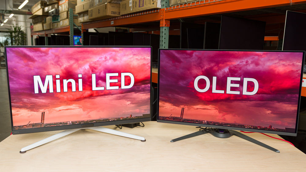 A Mini LED monitor next to an OLED monitor.