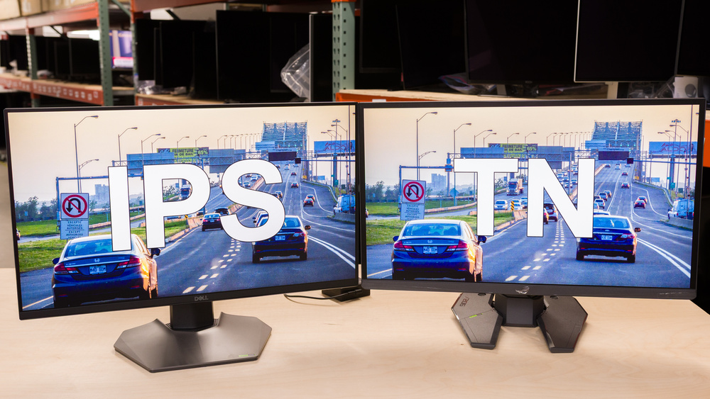 An IPS monitor next to a TN monitor.