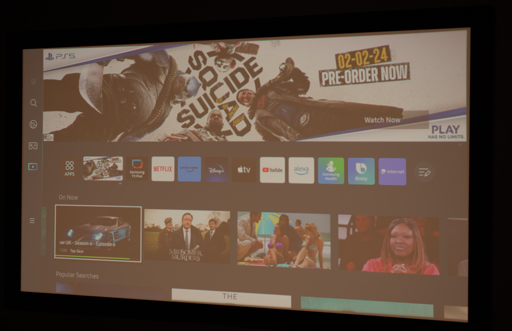 The Samsung The Freestyle 2nd Gen projecting a 100" image in our testing room with the lights on