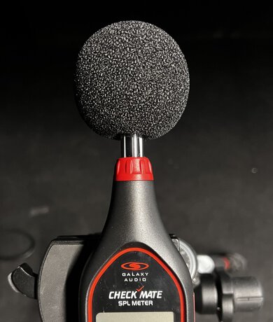 A picture showing the windshield attached to the SPL meter.