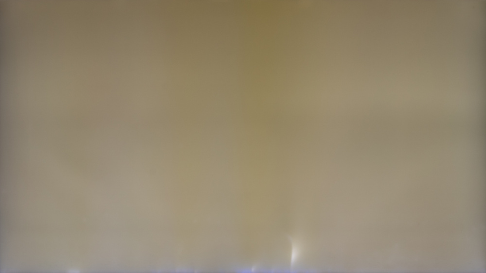 Screen bleeding along the bottom edge of the Samsung Q60B caused by a cracked light guide plate