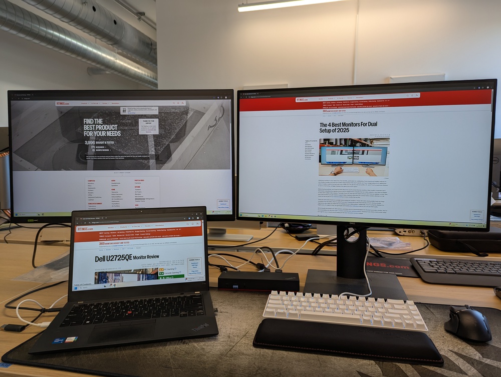 Two monitors connected to a laptop via a dock.