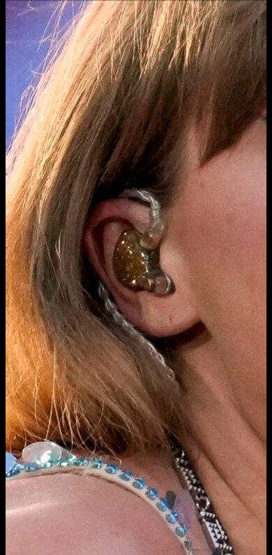 Taylor Swift with IEMs on.