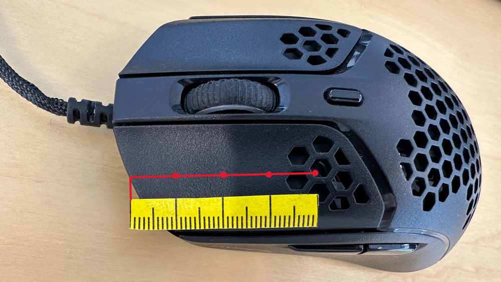 HyperX Pulsefire Haste with 4 cm measuring tape and testing points highlighted