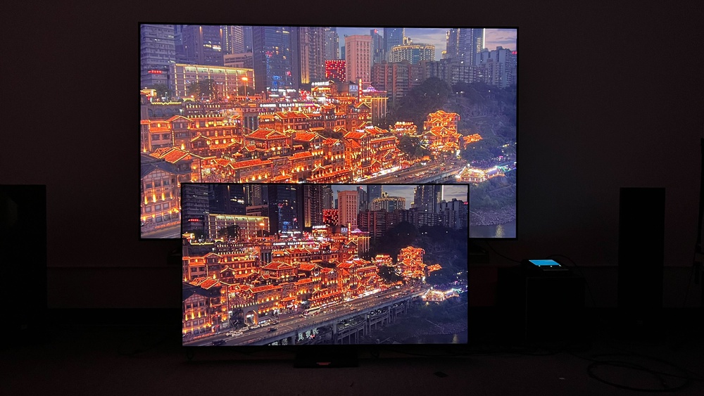 The 65-inch and 100-inch Samsung QN80F TVs.