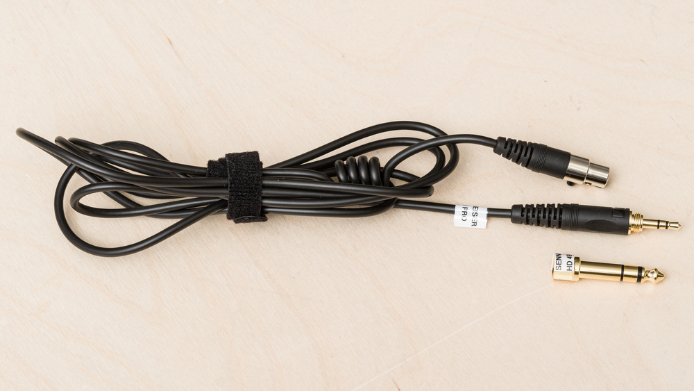 An image of a wrapped headphone audio cable belonging to the Sennheiser HD 490 PRO is shown with an adapter.