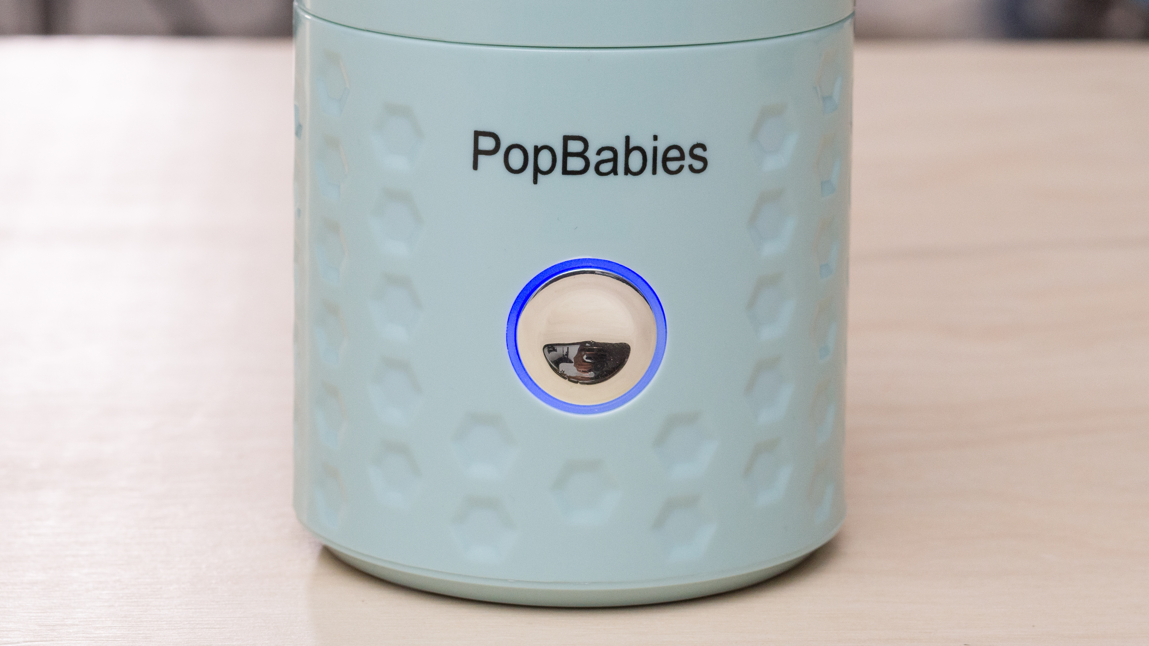 Portable blenders typically have simple controls, with just one button that runs short blending cycle (PopBabies Portable Blender)
