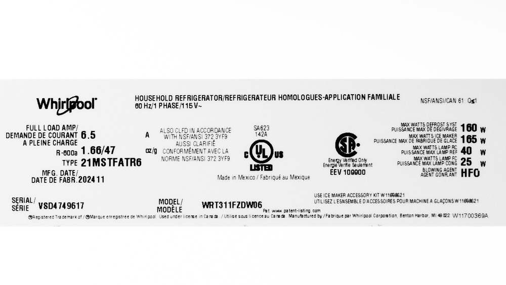 The fridge's label shows the serial number and its operating parameters. On the right, 'MAX WATTS DEFROST SYST' reads 160 W.