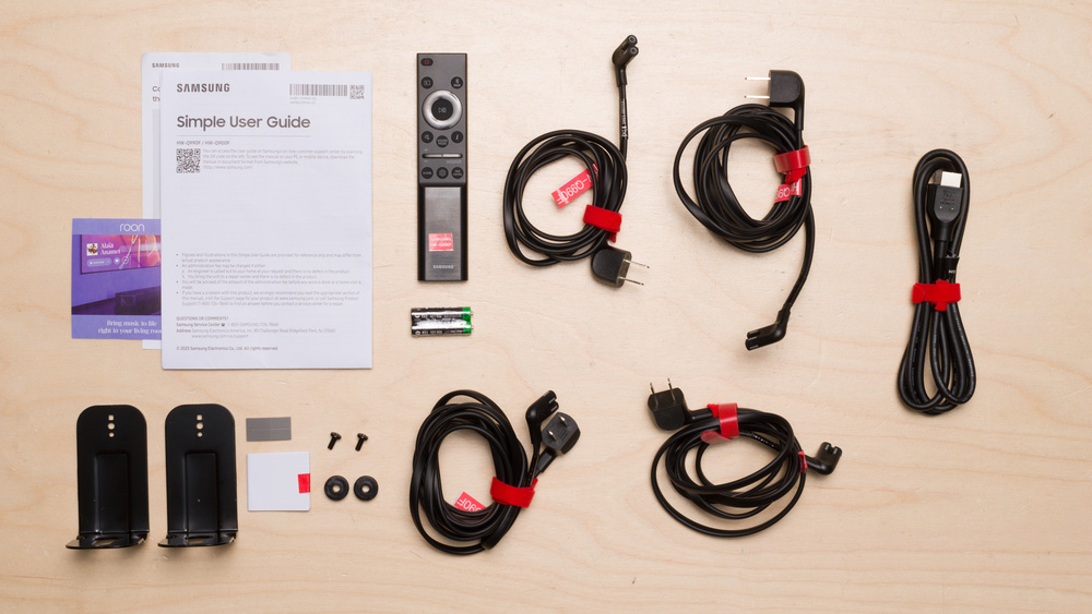 Various items included with the Samsung HW-Q990F soundbar. Notably, they come with an Ultra High Speed HDMI 2.1 cable.