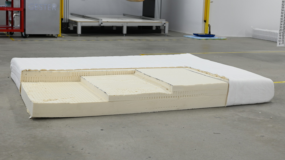 The Sleep on Latex Pure Green Organic cut open to show the different materials in each layer.