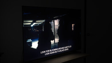 Picture of the dimming zone precision test on the Hisense QD7QF, showing significant haloing around bright highlights and subtitles