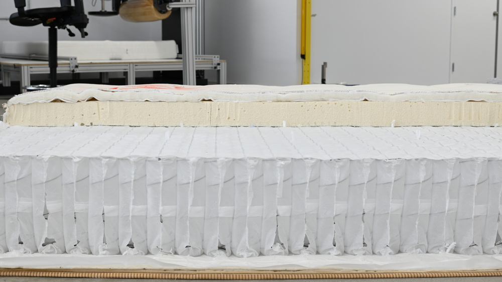 A close-up of the spring, latex, and wool layers of the Saatva Latex Hybrid.